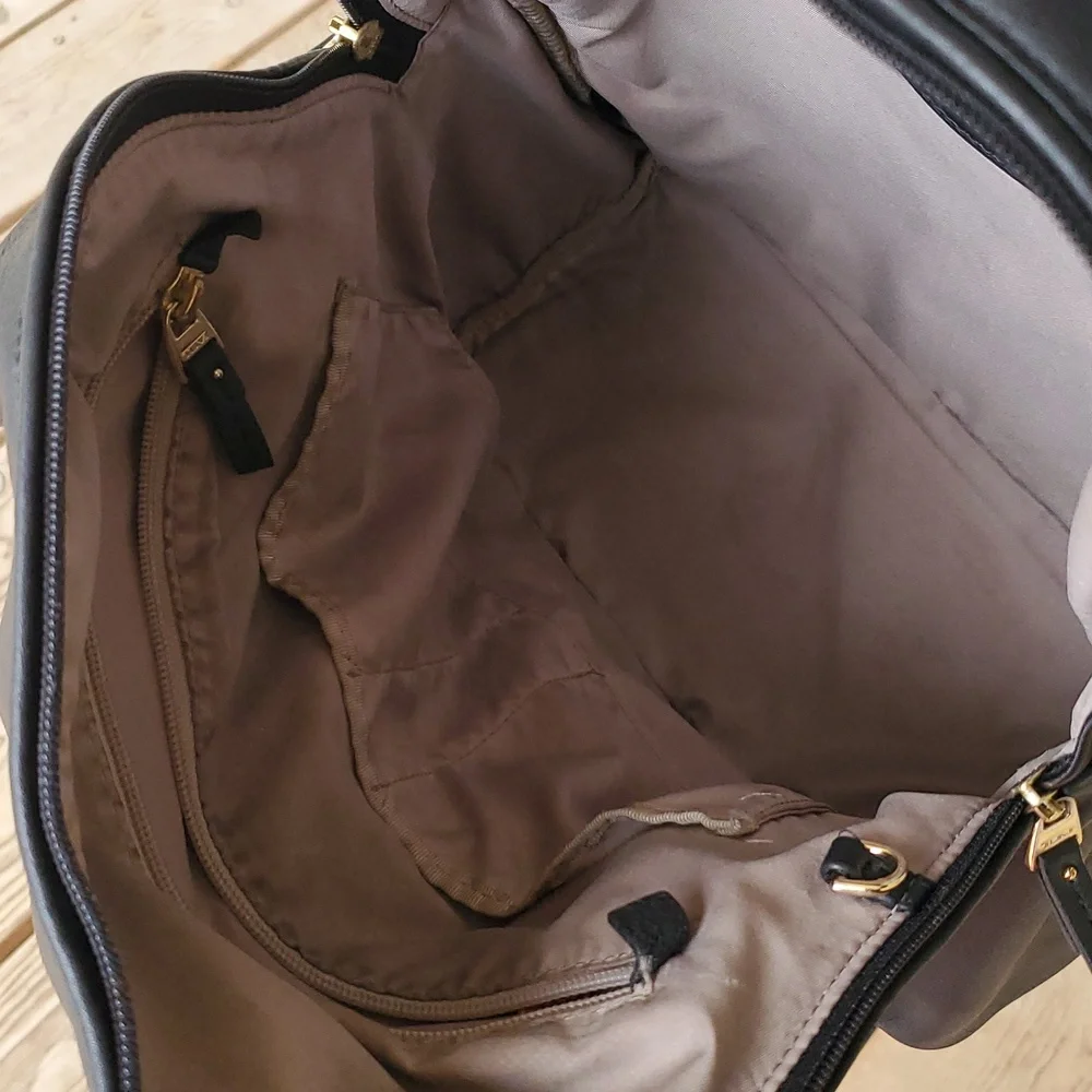 Tumi Voyageur Halle Black Leather Backpack with Gold Hardware